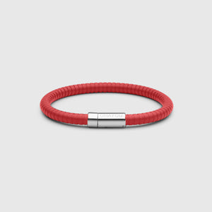 The rubber bracelet in red with stainless steel clasp. FKM fluoroelastomer rubber – Fully waterproof. White background.