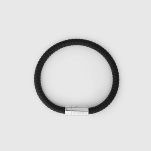 The rubber bracelet in black with stainless steel clasp. FKM fluoroelastomer rubber – Fully waterproof. White background.