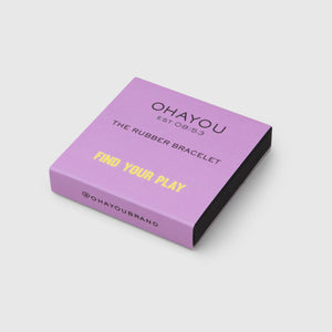 Purple Ohayou sleeve for The Rubber Bracelet packaging.